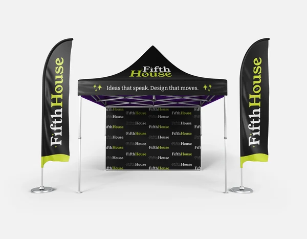 Trade show booth with a black canopy and matching banners on each side, displaying the logo 'Fifth House' in lime green and white, with the slogan 'Ideas that speak. Design that moves.' The back wall features a repeating pattern of the company's name in white and lime green.